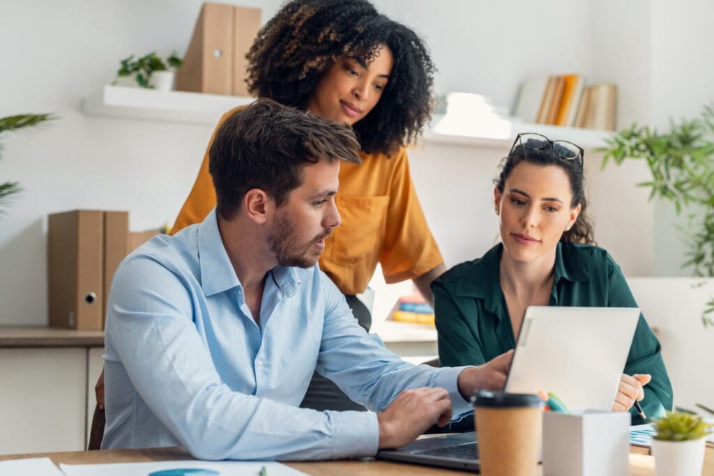 Shot,Of,Business,People,Working,With,Laptop,And,Talking,Of